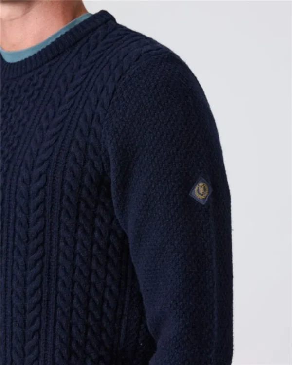 abersoch-cable-knit-jumper-model-side-logo-henri-lloyd-819x1024-1.webp Abersoch Cable Knit Jumper