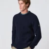 abersoch-cable-knit-jumper-navy-side-model-henri-lloyd-819x1024-1.webp Abersoch Cable Knit Jumper